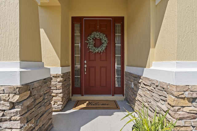 1100 Ashfield Way, Saint Johns, FL 32259 - doorway to property with stone siding and stucco siding