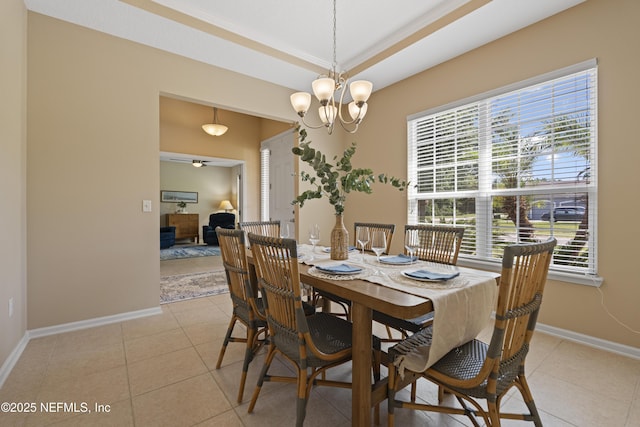 1100 Ashfield Way, Saint Johns, FL 32259 - dining space with light tile patterned floors and a chandelier