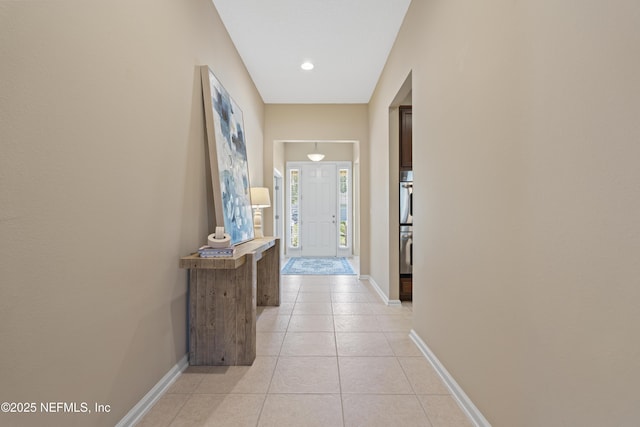 1100 Ashfield Way, Saint Johns, FL 32259 - doorway to outside featuring baseboards and light tile patterned flooring