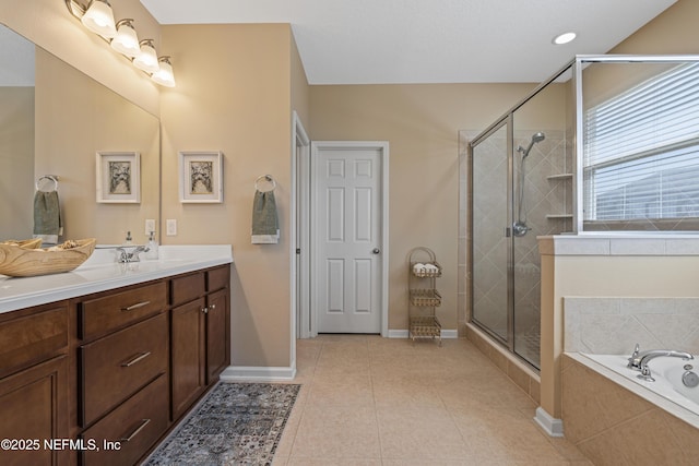 1100 Ashfield Way, Saint Johns, FL 32259 - bathroom with vanity, a bath, a stall shower, and tile patterned floors