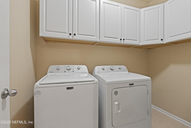 1100 Ashfield Way, Saint Johns, FL 32259 - laundry area featuring washer and dryer and cabinet space
