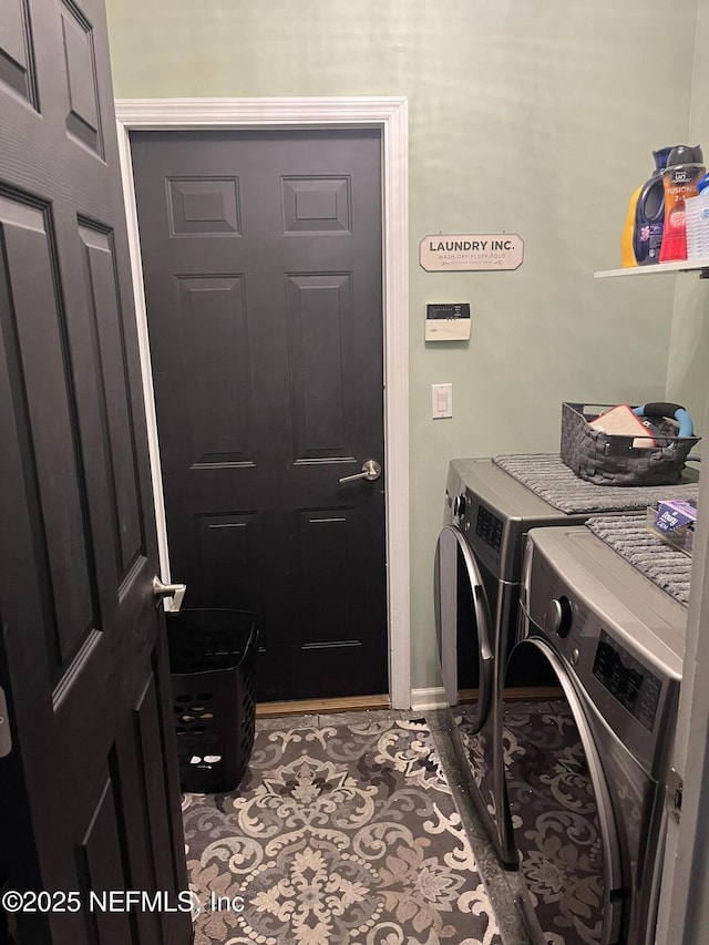 2506 Willow Creek Dr, Fleming Island, FL 32003 - washroom featuring washing machine and clothes dryer and tile patterned floors