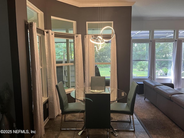 2506 Willow Creek Dr, Fleming Island, FL 32003 - dining area featuring ornamental molding and stone finish flooring