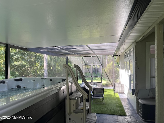 2506 Willow Creek Dr, Fleming Island, FL 32003 - sunroom / solarium with a hot tub and plenty of natural light