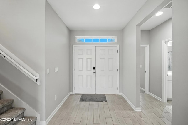 63 Goldcrest Way, Saint Augustine, FL 32092 - entryway with light wood-type flooring, stairs, and recessed lighting