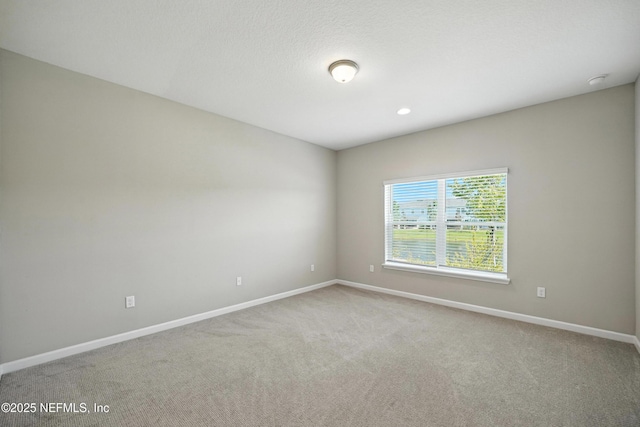 63 Goldcrest Way, Saint Augustine, FL 32092 - spare room with baseboards and carpet