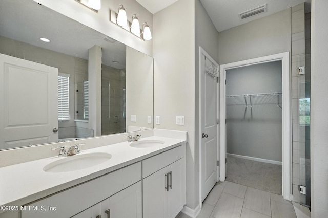 63 Goldcrest Way, Saint Augustine, FL 32092 - full bath with a stall shower, double vanity, and a walk in closet