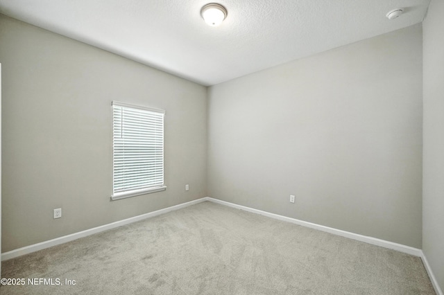 63 Goldcrest Way, Saint Augustine, FL 32092 - carpeted empty room featuring a smoke detector and baseboards
