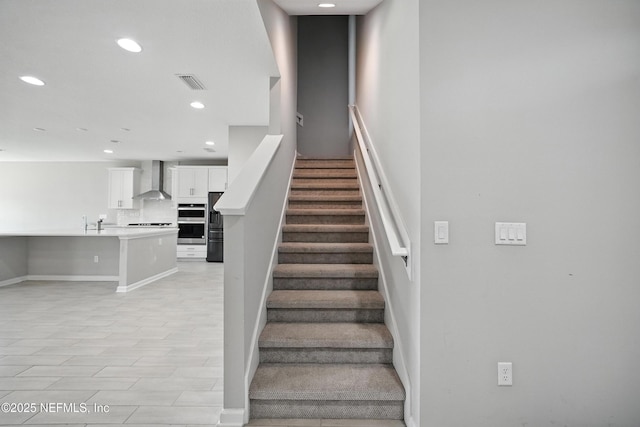 63 Goldcrest Way, Saint Augustine, FL 32092 - stairway with recessed lighting