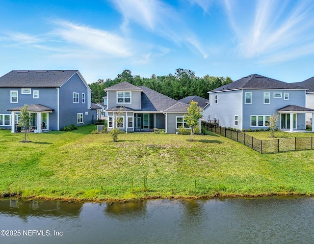 63 Goldcrest Way, Saint Augustine, FL 32092 - rear view of property with a sunroom, a gazebo, and a water view