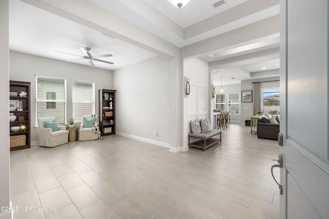 147 Rawlings Dr, Saint Johns, FL 32259 - living area with ceiling fan and light tile patterned floors