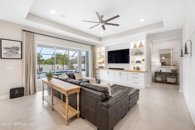 147 Rawlings Dr, Saint Johns, FL 32259 - living area with a ceiling fan, a tray ceiling, a sunroom, and recessed lighting