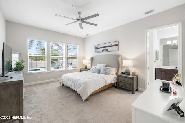 147 Rawlings Dr, Saint Johns, FL 32259 - bedroom featuring light colored carpet, connected bathroom, and ceiling fan