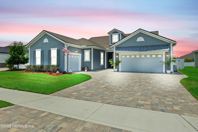 147 Rawlings Dr, Saint Johns, FL 32259 - view of front facade featuring an attached garage and decorative driveway