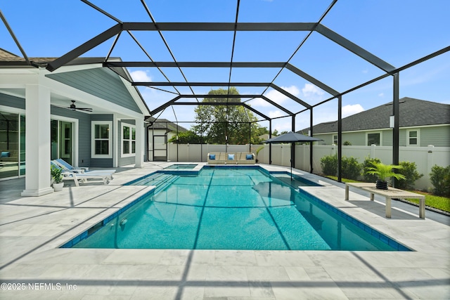 147 Rawlings Dr, Saint Johns, FL 32259 - view of pool featuring a patio area, a ceiling fan, a pool with connected hot tub, and glass enclosure