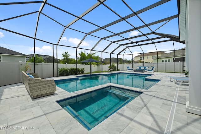 147 Rawlings Dr, Saint Johns, FL 32259 - view of pool with outdoor lounge area, a patio area, a fenced backyard, a residential view, and a pool with connected hot tub