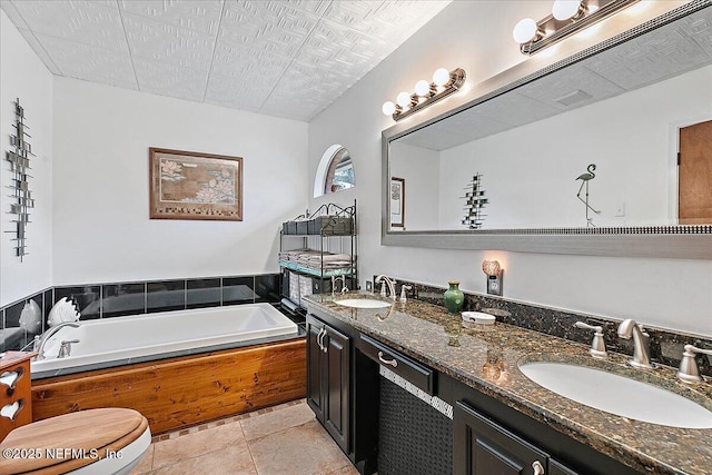 2282 Osceola Forest Ct, Fruit Cove, FL 32259 - full bath with a garden tub, double vanity, and tile patterned floors