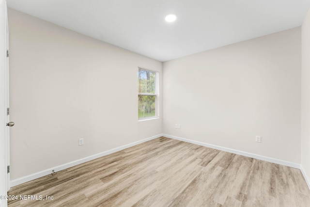 2626 Sandra Ln, Jacksonville, FL 32208 - spare room with wood finished floors and recessed lighting