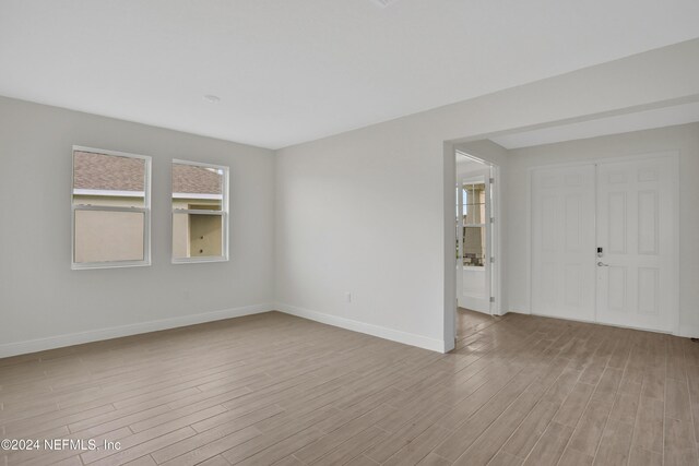3245 Pipers Way, Green Cove Springs, FL 32043 - empty room with light wood finished floors and baseboards
