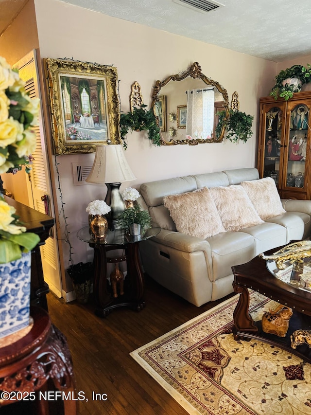 2529 W 28th St, Jacksonville, FL 32209 - living area featuring hardwood / wood-style floors and a textured ceiling