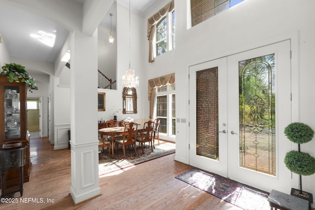 3305 US Highway 17, Fleming Island, FL 32003 - doorway featuring french doors, wood finished floors, and a towering ceiling