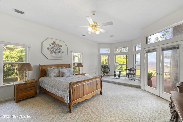 3305 US Highway 17, Fleming Island, FL 32003 - bedroom featuring light colored carpet, french doors, access to outside, and a ceiling fan