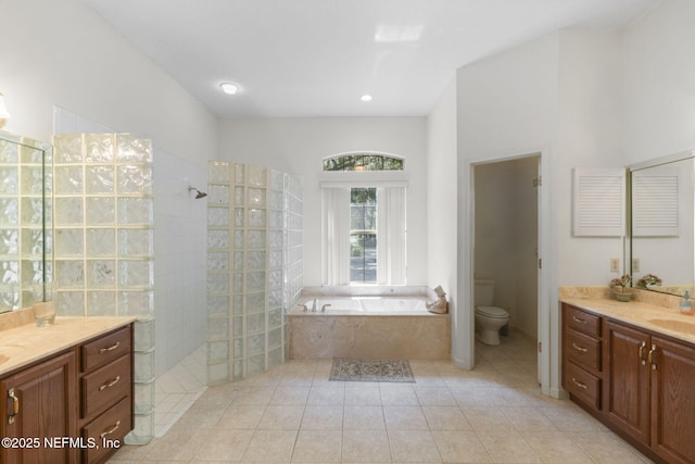3305 US Highway 17, Fleming Island, FL 32003 - bathroom with a bath, vanity, walk in shower, and tile patterned flooring