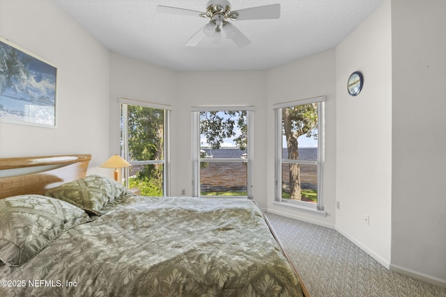 3305 US Highway 17, Fleming Island, FL 32003 - carpeted bedroom featuring baseboards and a ceiling fan