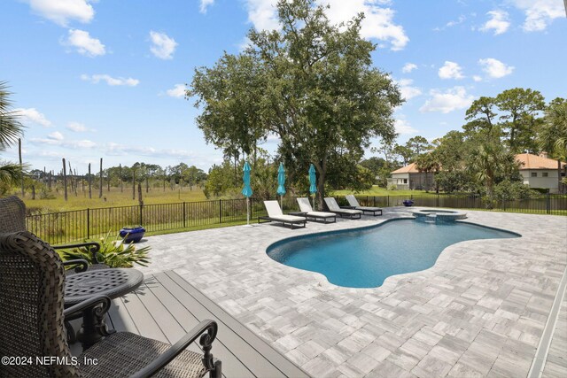 105 Teal Nest Ct, Ponte Vedra Beach, FL 32082 - view of swimming pool featuring a patio area, a fenced backyard, and a pool with connected hot tub