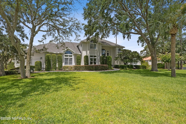 105 Teal Nest Ct, Ponte Vedra Beach, FL 32082 - view of front of property with a front yard and stucco siding