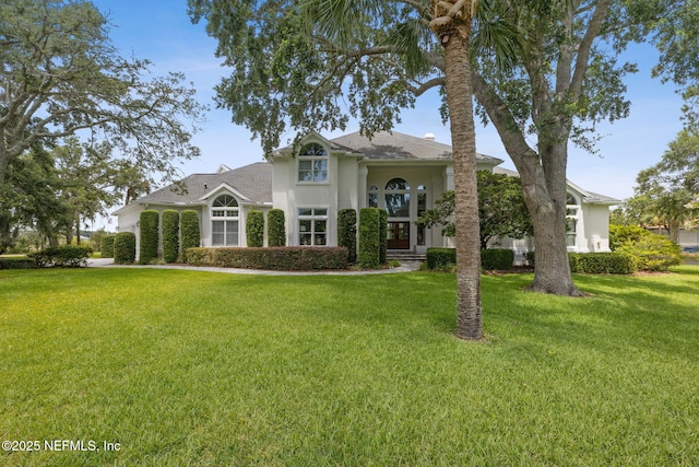 105 Teal Nest Ct, Ponte Vedra Beach, FL 32082 - view of front of property featuring a front lawn and stucco siding