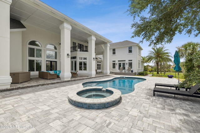 105 Teal Nest Ct, Ponte Vedra Beach, FL 32082 - view of pool with an outdoor living space, a patio area, french doors, a pool with connected hot tub, and a ceiling fan