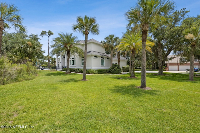 105 Teal Nest Ct, Ponte Vedra Beach, FL 32082 - view of green lawn featuring a garage