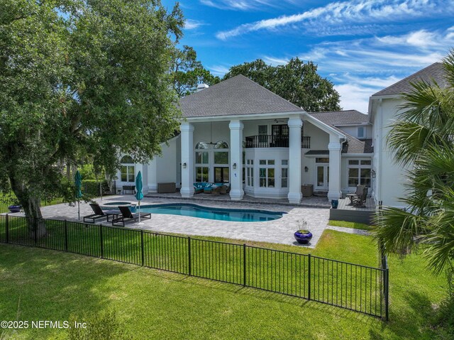 105 Teal Nest Ct, Ponte Vedra Beach, FL 32082 - rear view of property with a fenced backyard, a balcony, french doors, a patio area, and stucco siding