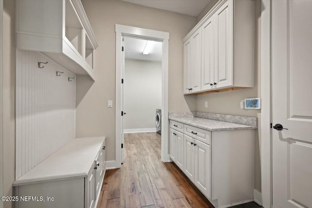 305 Seahill Dr, Saint Augustine, FL 32092 - mudroom with wood finished floors and washer / clothes dryer