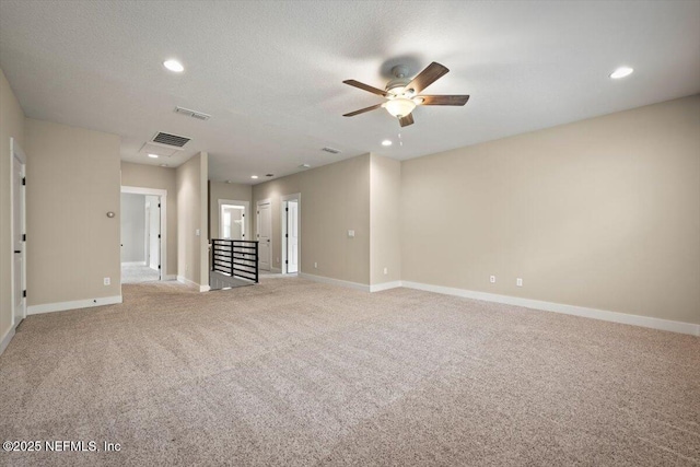 305 Seahill Dr, Saint Augustine, FL 32092 - unfurnished room featuring ceiling fan, light carpet, and recessed lighting