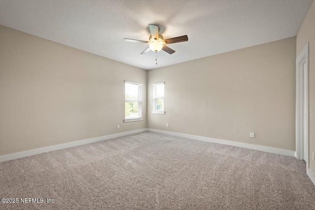 305 Seahill Dr, Saint Augustine, FL 32092 - carpeted spare room featuring a ceiling fan and a textured ceiling