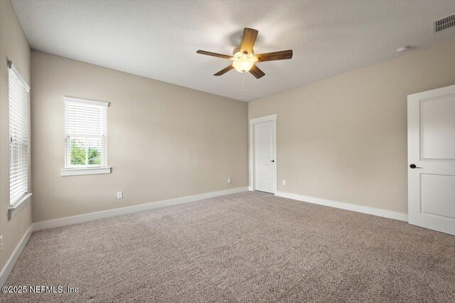 305 Seahill Dr, Saint Augustine, FL 32092 - carpeted empty room with a ceiling fan and a smoke detector