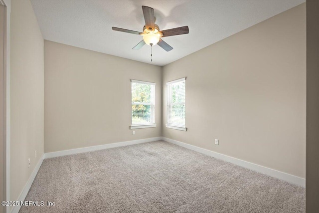 305 Seahill Dr, Saint Augustine, FL 32092 - carpeted empty room featuring ceiling fan and baseboards