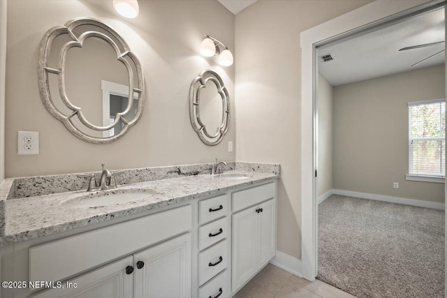 305 Seahill Dr, Saint Augustine, FL 32092 - full bathroom featuring double vanity and tile patterned flooring