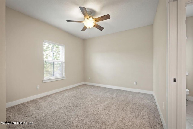 305 Seahill Dr, Saint Augustine, FL 32092 - carpeted empty room with ceiling fan and baseboards