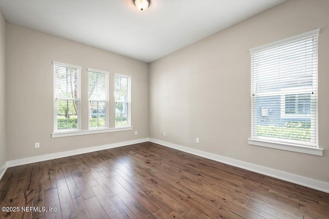 305 Seahill Dr, Saint Augustine, FL 32092 - spare room with dark wood-style flooring