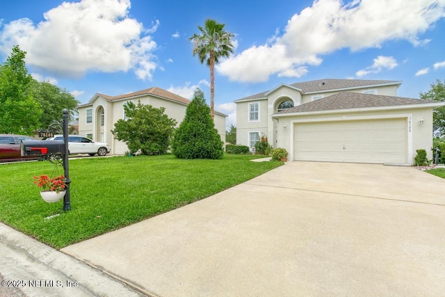 76146 Long Leaf Loop, Yulee, FL 32097 - traditional-style house featuring stucco siding, a front lawn, driveway, and a garage