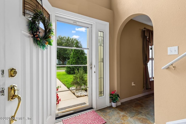 76146 Long Leaf Loop, Yulee, FL 32097 - foyer entrance with healthy amount of natural light and arched walkways