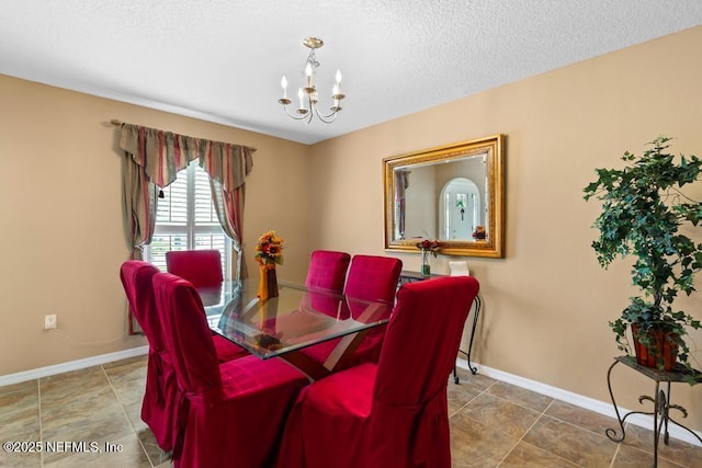 76146 Long Leaf Loop, Yulee, FL 32097 - dining room featuring a chandelier and a textured ceiling