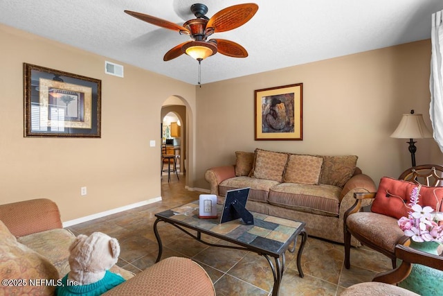 76146 Long Leaf Loop, Yulee, FL 32097 - living room with arched walkways and ceiling fan