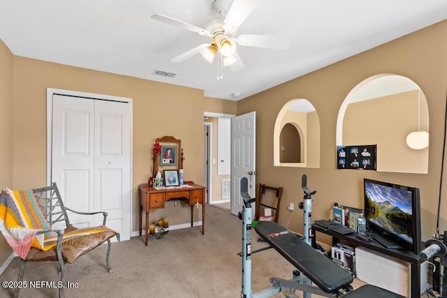 76146 Long Leaf Loop, Yulee, FL 32097 - exercise room featuring carpet flooring and a ceiling fan
