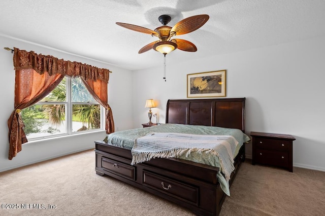 76146 Long Leaf Loop, Yulee, FL 32097 - bedroom with light carpet, a textured ceiling, and ceiling fan