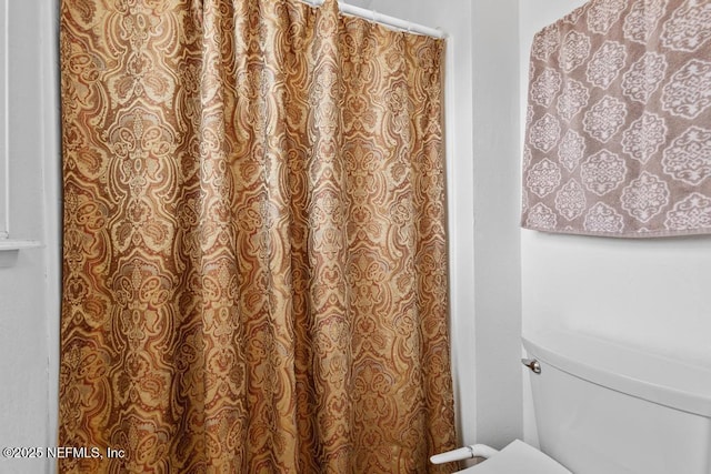 76146 Long Leaf Loop, Yulee, FL 32097 - full bathroom featuring toilet and curtained shower