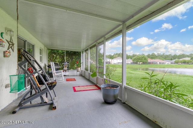 76146 Long Leaf Loop, Yulee, FL 32097 - unfurnished sunroom with a water view